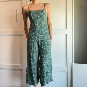 A green floral light jumper